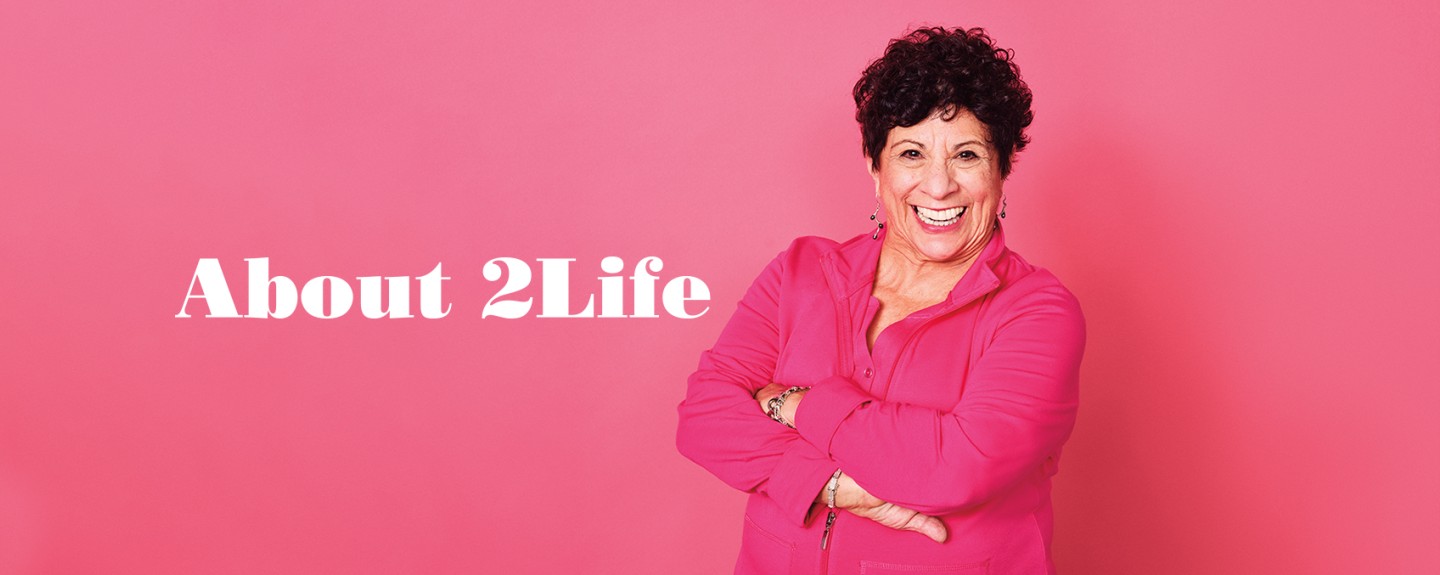 About 2Life banner with woman in pink against a pink background